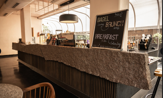 Crafting Authenticity: The 6-Ton Boulder Counter at Ariko Cafe